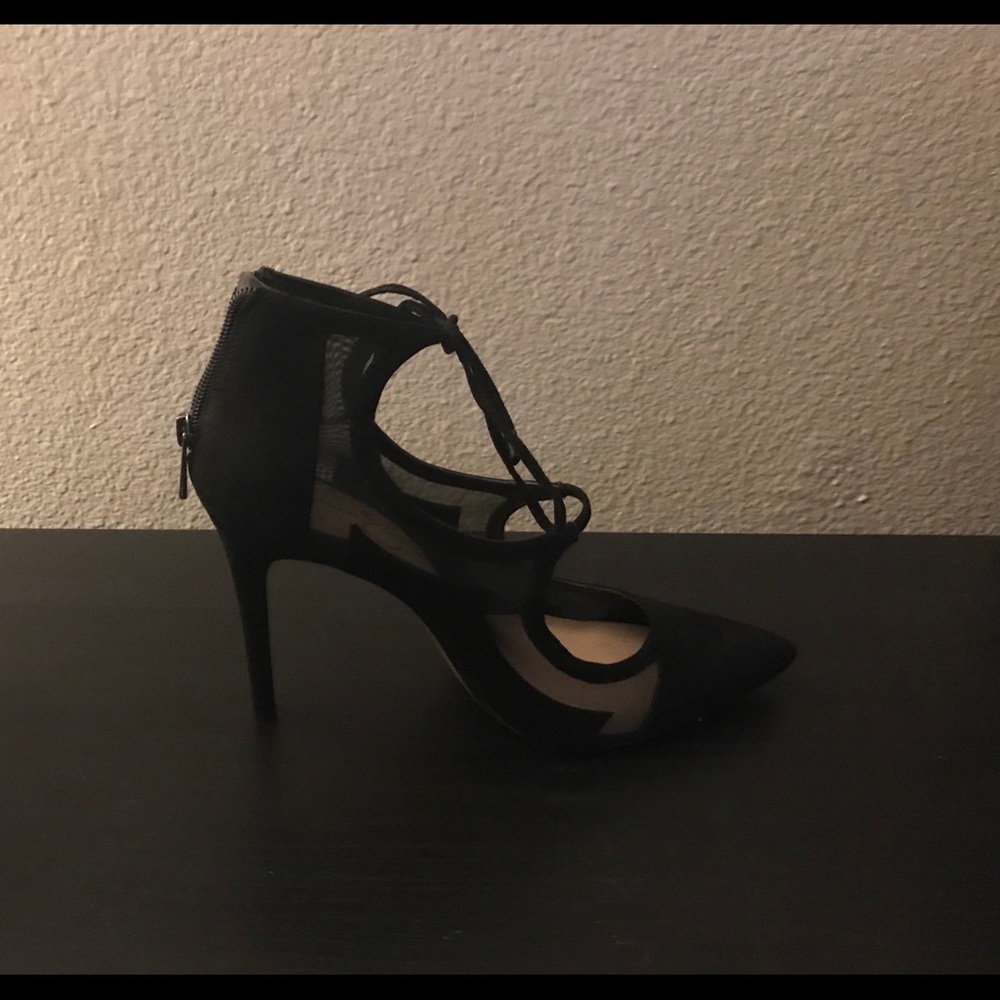 Black Jessica Simpson pumps with mesh detail